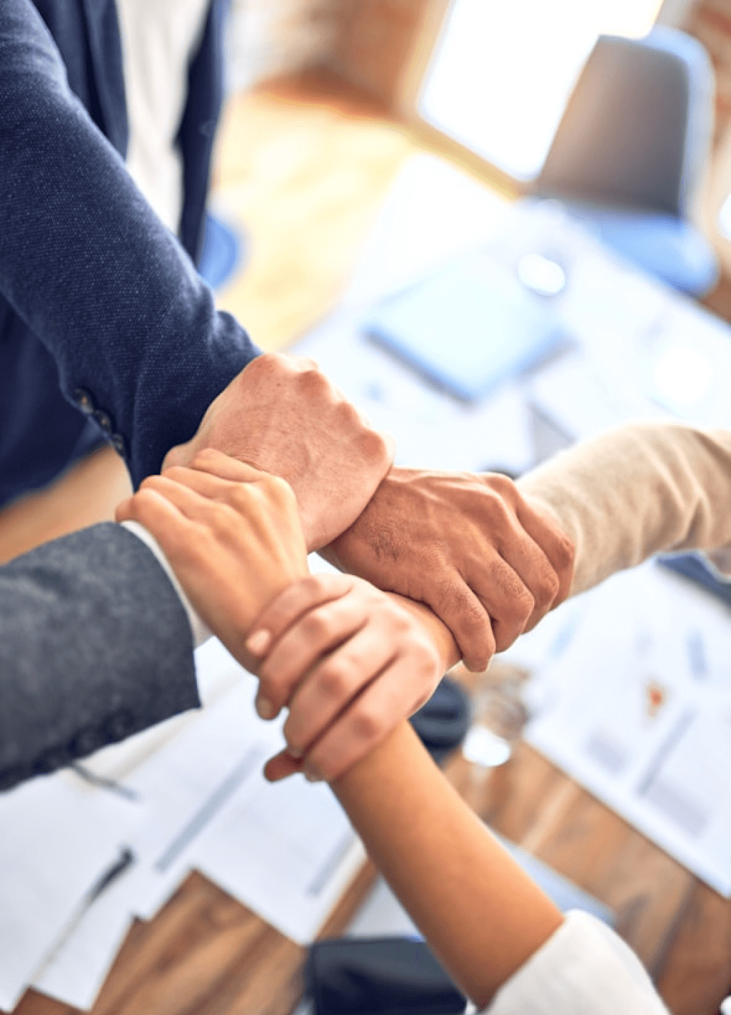 Group of hands holding each other